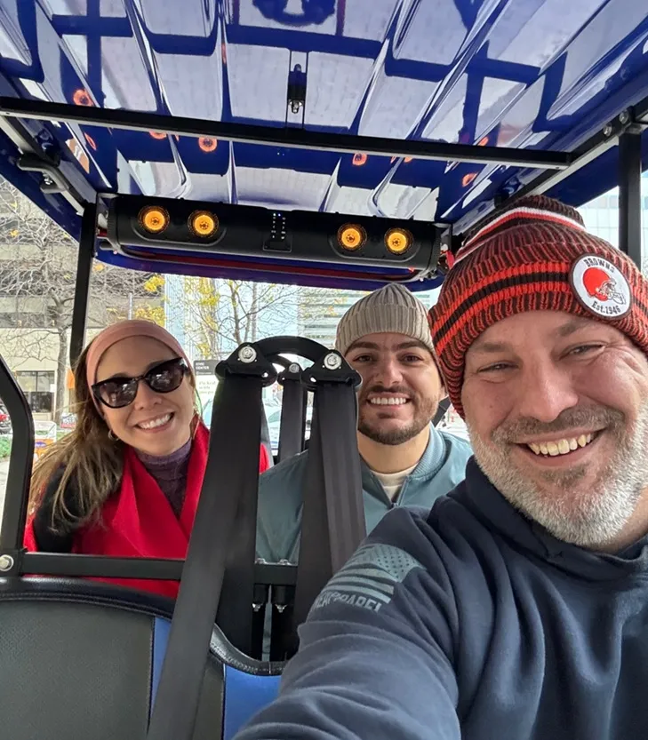 Guests riding through Cleveland with The Golf Cart Girl-CLE.