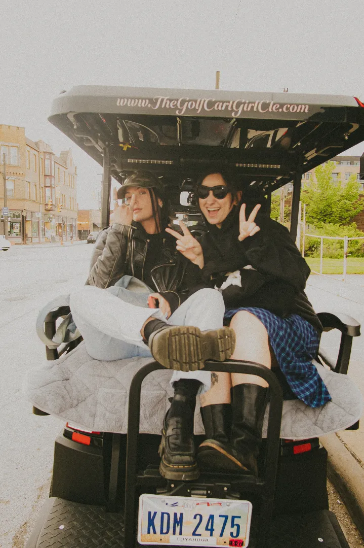 Riders having fun on a Golf Cart Girl-CLE experience.