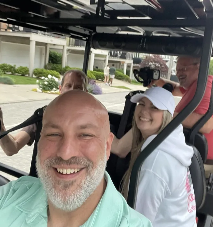 A fun group moment during a Golf Cart Girl-CLE ride.