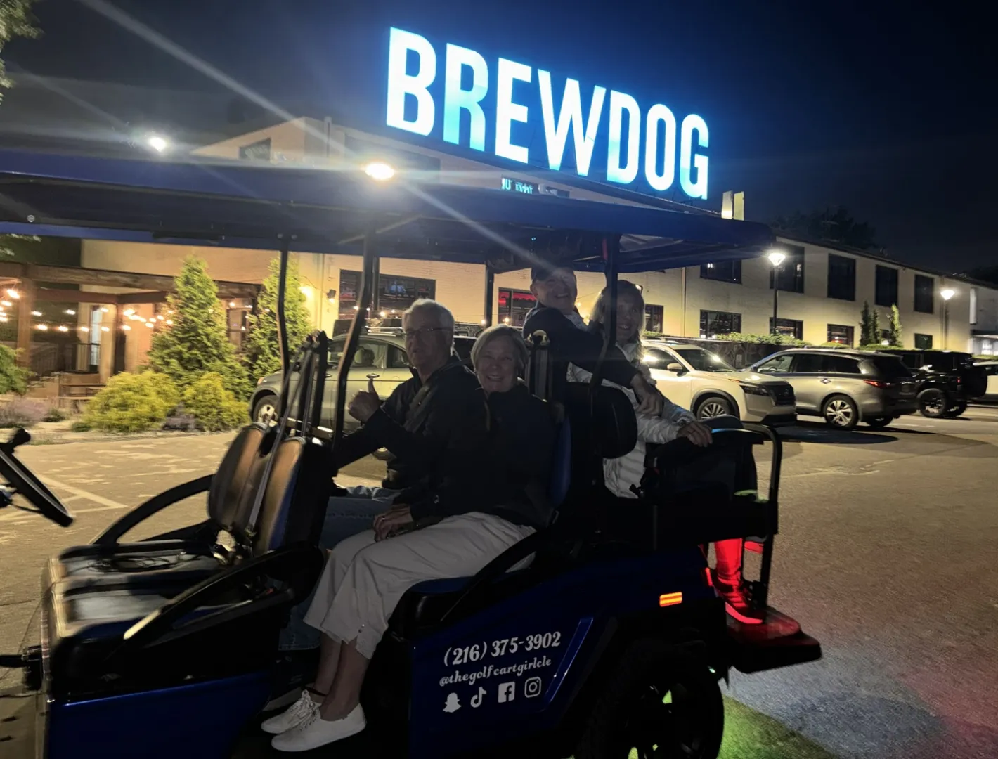 A double date group enjoying a Cleveland brewery cart experience.