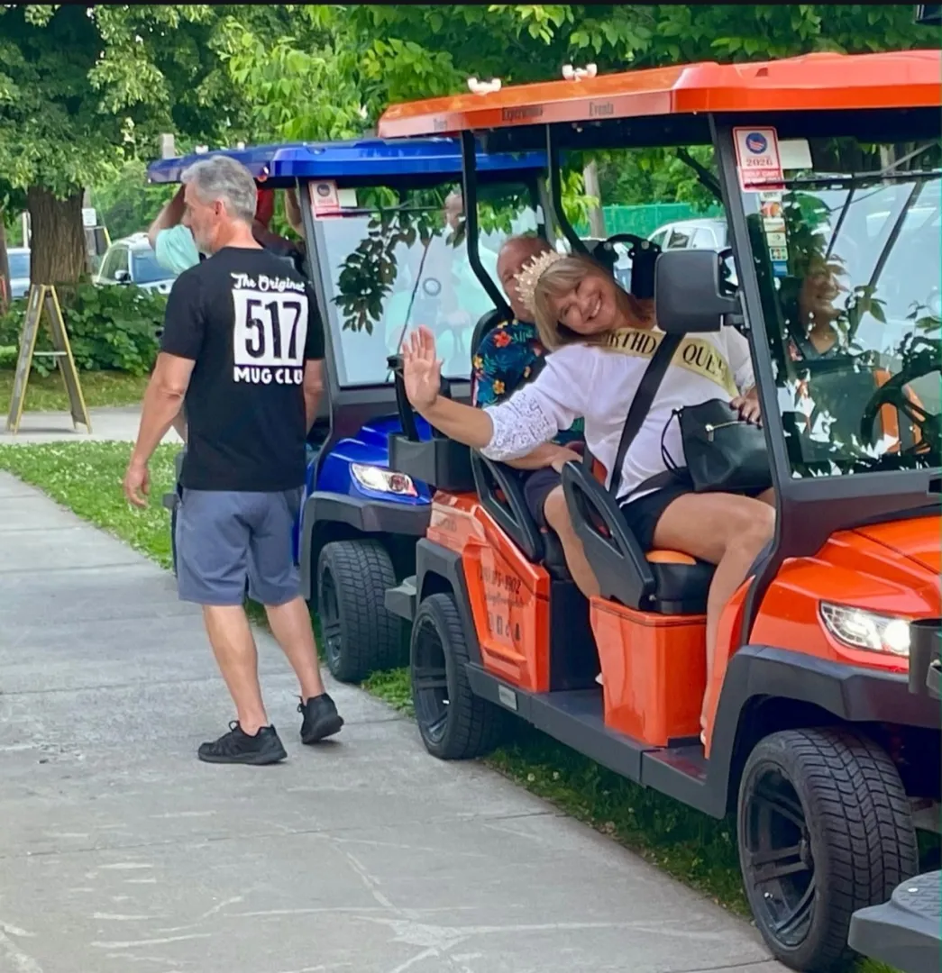 A Golf Cart Girl-CLE cart moment at a Cleveland brewery stop.