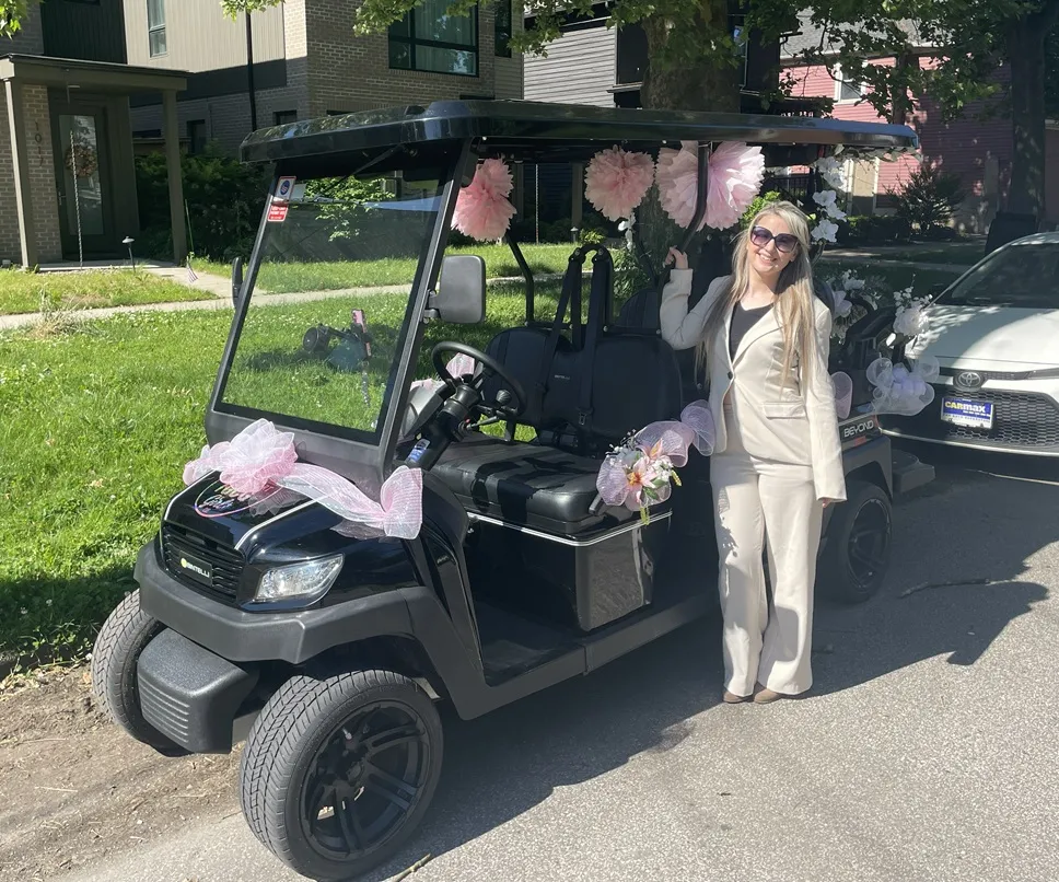 A Golf Cart Girl-CLE cart at a wedding celebration.